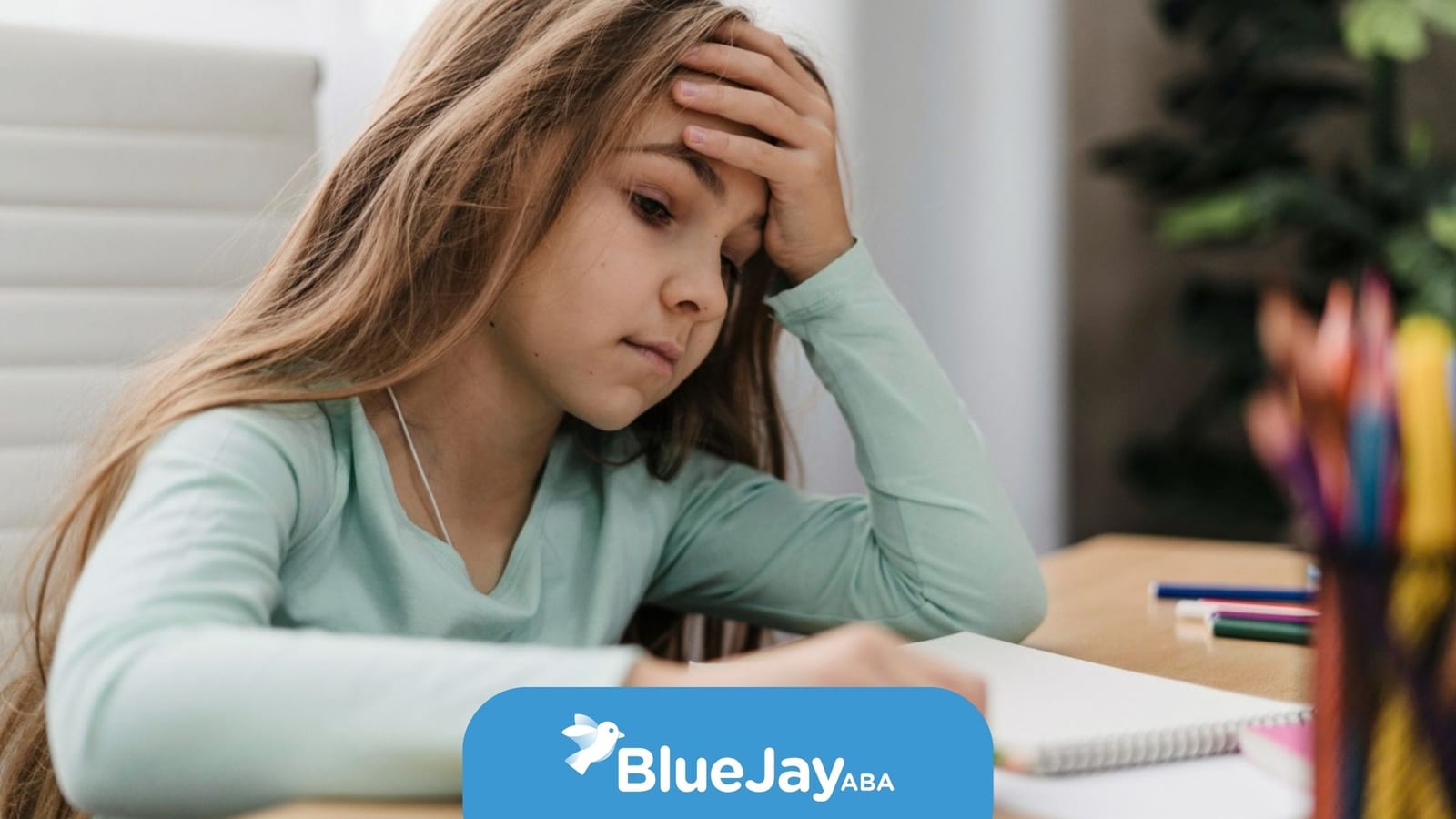 Autistic child feeling overwhelmed while doing schoolwork.