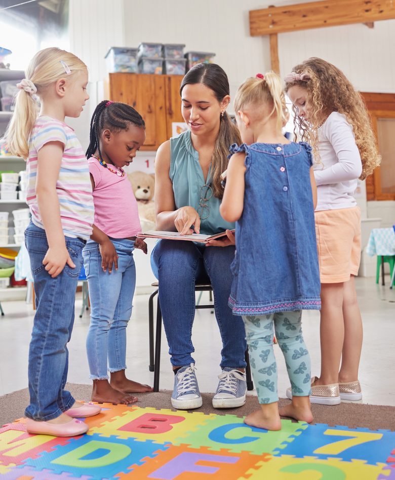 Young children playing and learning together in a group