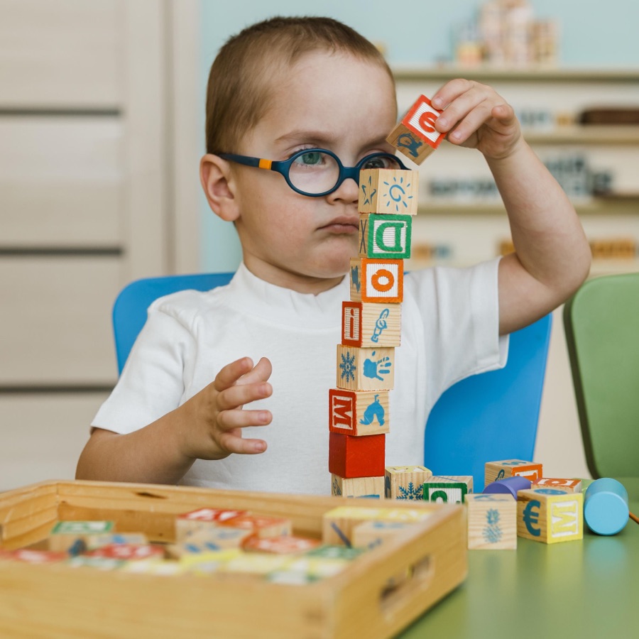 A clinician assessing a child during an in-home visit
